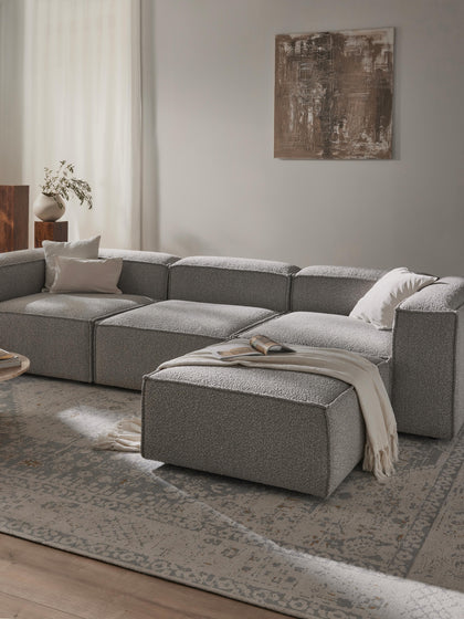 Westwing Collection Modulares Sofa Lennon (4-Sitzer) aus Bouclé mit Hocker (links/rechts) Wochenangebot